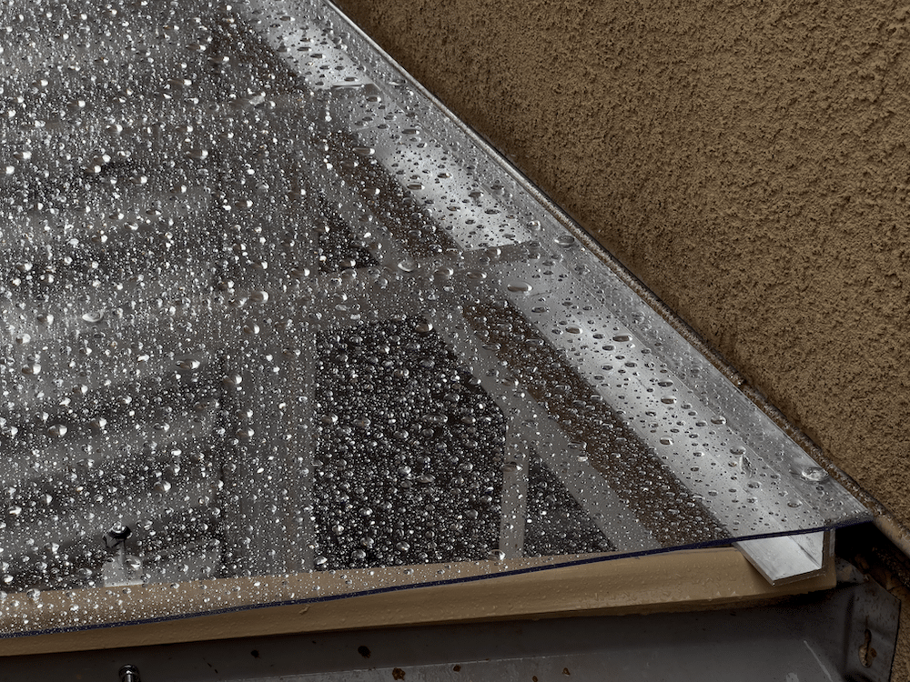 Window Well Cover in Rain